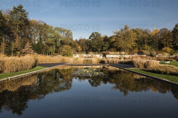 Panoramic view over the Stuyvenbergh city park with reflecting colorful autumn trees, Brussels, Belgium, Europe