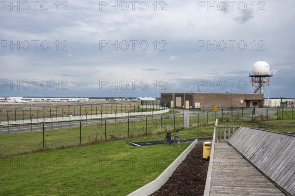 Zaventem, Flemish Brabant Region, Belgium, 09 18 2022, Wooden bench at the observation point for airplane spotting, Europe