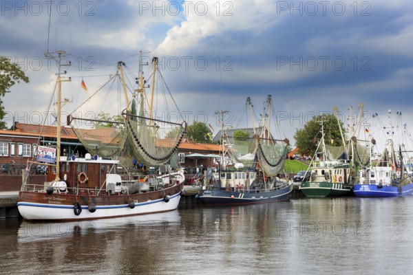 Traditional shrimp boats in the harbour of Greetsiel, East Frisia, Germany, Europe