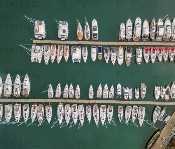 Aerial top view on the luxury yachts and boats in marina