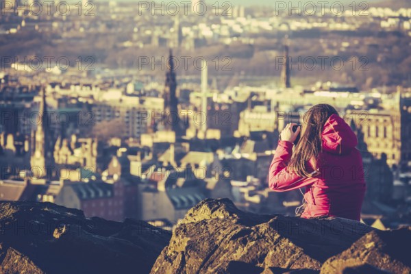 Young Woman Tourist Photographer In Edinburgh Scotland At Sunset