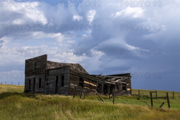 Prairie Storm Canada Summer time clouds abandoned building