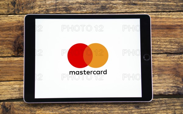 Smart phone with the Mastercard logo that is a brand of credit and debit cards