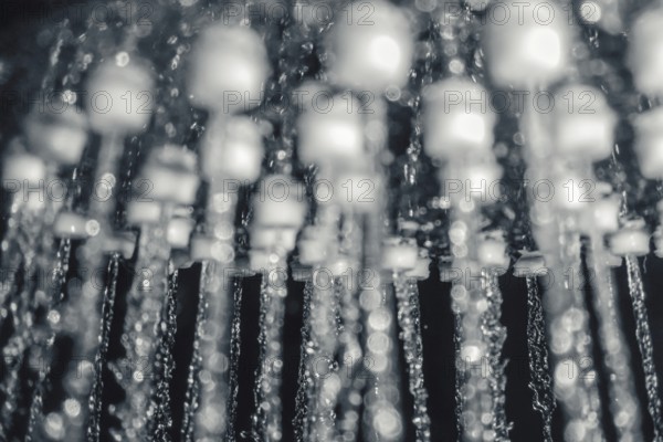 Shower head with running water closeup