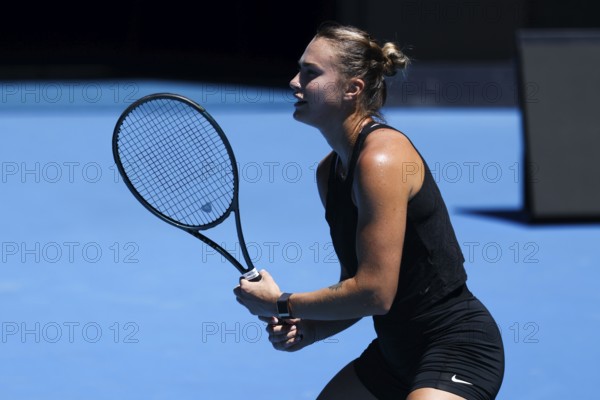 MELBOURNE, AUSTRALIA, JANUARY 12: Aryna Sabalenka of Belarus practices with Paula Badosa of Spain ahead of the 2024 Australian Open at Melbourne Park on January 12, 2024 in Melbourne, Australia, Oceania