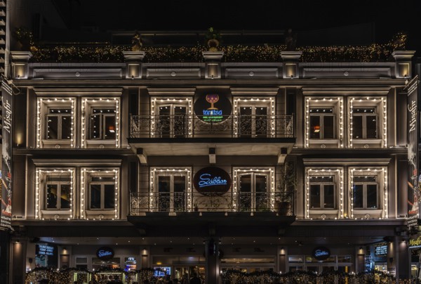 Athens Old Town, Attica, Greece, 12 28 2019, View over the facade of the Taratsa Roofgarden Sabas restaurant and bar by night, Europe