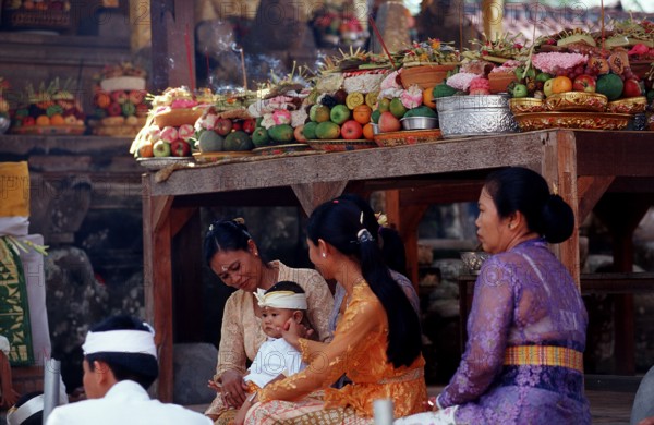 Woman with offerings in Hindu temple Ubud, Indonesia, Bali, Ubud, Asia