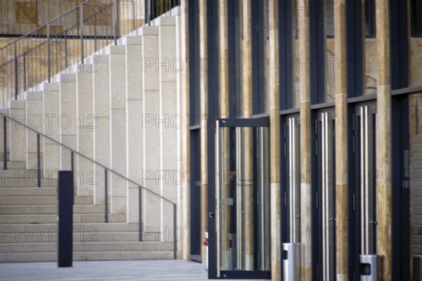 The modern exterior façade of the Rhein Main Congress Centre in Wiesbaden at the entrances