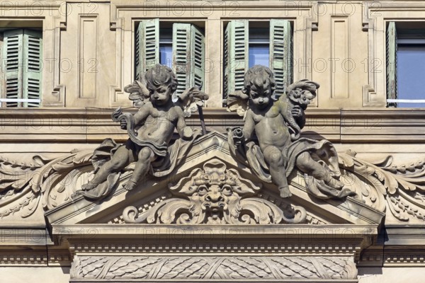 House facade with angels