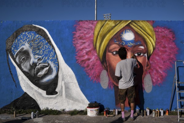 Germany, Berlin, 09.06.2024, Sunday afternoon in Mauerpark, Graffiti Wall (inner wall), Eme Freethinker, at work, Europe