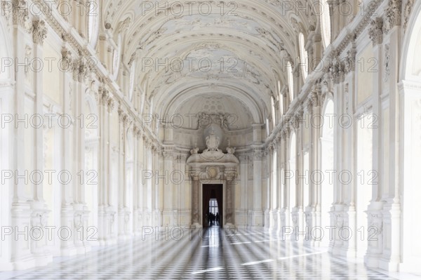 Reggia di Venaria Reale, Italy, October 2022: corridor perspective, luxury marble, gallery and windows, Royal palace, Europe
