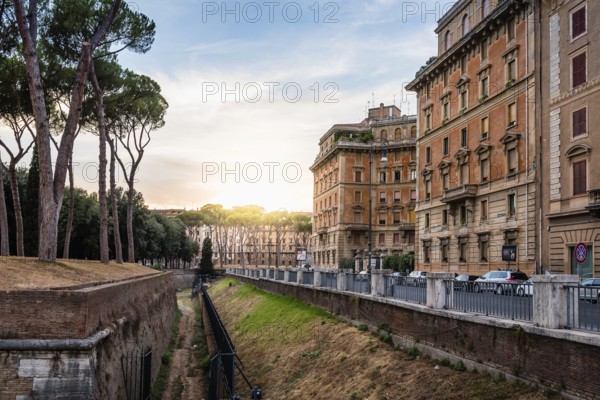 Rome, Italy, August 18, 2016: Sunset on Piazza Adriana in Rome near Castel Sant Angelo. The Mausoleum of Hadrian, usually known as Castel Sant'Angelo is a towering cylindrical building in Rome, Europe