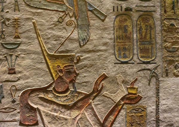 Ancient egypt carving color image on wall of temple in Egypt