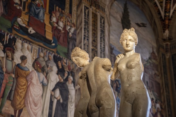 SIENA, ITALY, SEPTEMBER 23, 2023, Rich ornate famous Piccolomini Library in the cathedral of Siena with Three Graces in the center