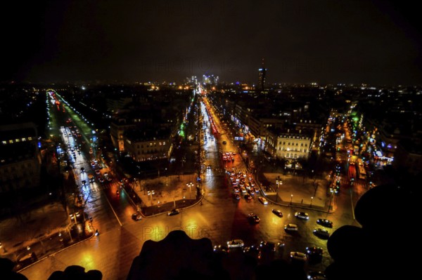 View from Arc de triomphe at night, Photo image a Beautiful panoramic view of Paris Metropolitan City