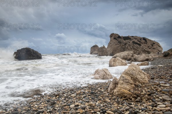 Seascape with windy waves during stormy weather at the rocky coastal area of the Rock of Aphrodite Petra tou romiou, in Paphos, Cyprus, Europe