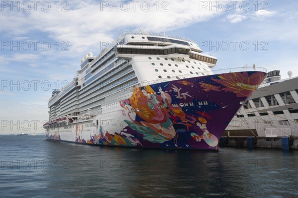 11.12.2020, Singapore, Republic of Singapore, Asia, Genting Cruise Lines' cruise ship World Dream, which is operated under the Dream Cruise brand, is moored at Marina Bay Cruise Centre Singapore. The giant passenger ship is Singapore's first pandemic cruise ship, offering so-called cruises to nowhere, after the Southeast Asian city-state and its tourism-dependent economy reopened to tourism two months ago despite the ongoing global coronavirus (Covid-19) pandemic. The two-nighters will depart from their home port in Singapore every Wednesday and Friday until 30 December, and the three-nighters every Sunday, Asia