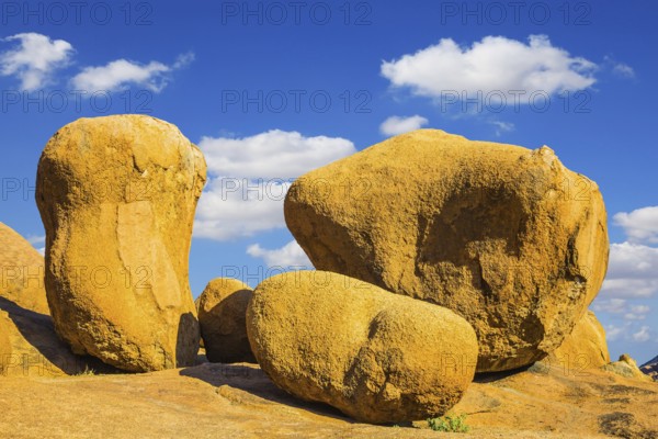 Huge granite stones and rocks on a background of blue sky. Desert Namib, Spitzkoppe, Namibia. Concept of extreme and ecological tourism