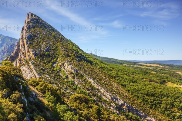 Picturesque cliff in the French Alps. The fascinating journey to the most beautiful canyon in Europe - Verdon. Concept of ecological, extreme and active tourism