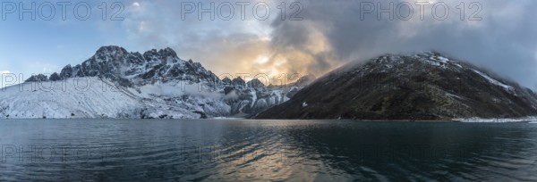 Gokyo lake and mountains at sunset. Dramatic sky. Himalaya, nepal