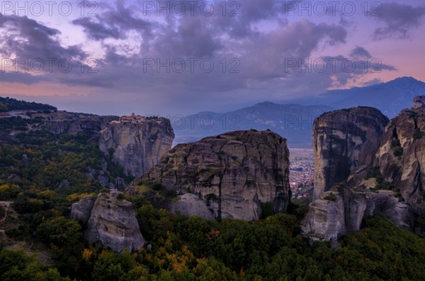 Hilltop monastery of the Holy Trinity at dawn, rocks of Meteora, Trikala, Thessaly, Greece, Europe