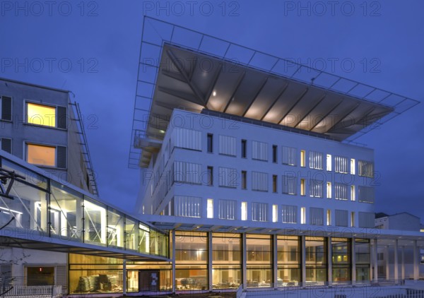 New construction of the University Hospital for Surgery with helicopter landing pad, dusk, Erlangen, Middle Franconia, Bavaria, Germany, Europe