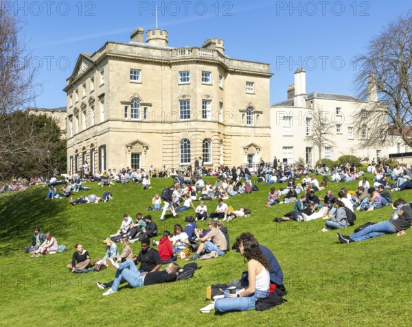 Students on lawn sunbathing, Royal Fort House architect James Bridges 1761, University of Bristol, England, UK