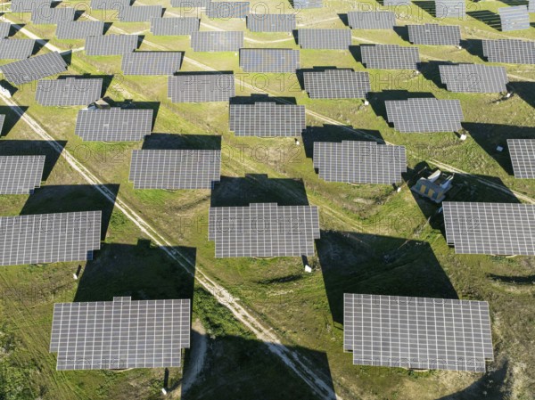 Rows of solar panels at a photovoltaic plant near town of Espejo. Aerial view. Drone shot. Córdoba province, Andalucía, Spain, Europe