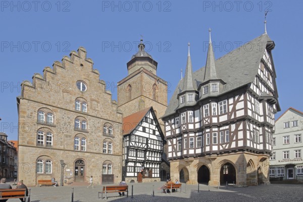 Gothic wine house built in 1539 of the Renaissance, church tower of the and half-timbered town hall built in 1516 with turrets and decorations, church tower of the Walpurgis church, people, pedestrians, market square, Alsfeld, Vogelsberg, Hesse, Germany, Europe