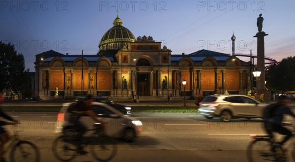 Cyclist, illuminated Ny Carlsberg Glyptotek or New Carlsberg Glyptotek in the evening, Art Museum of Sculpture and Painting, Hans Christian Andersens Boulevard, Copenhagen, Denmark, Europe