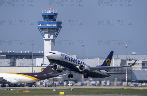Ryanair Boeing 737 taking off at Cologne-Bonn Airport, CGN, North Rhine-Westphalia, Germany Air traffic control tower