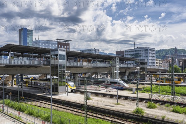 The railway tracks and arriving trains at Freiburg main station seen from the west, Freiburg im Breisgau, Baden-Württemberg, Germany, Europe
