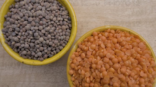 Split Red Lentils and Whole Brown Lentils in Yellow Bowl, Vegan Food, Top View, Healthy Legume Comparison, Flat Lay