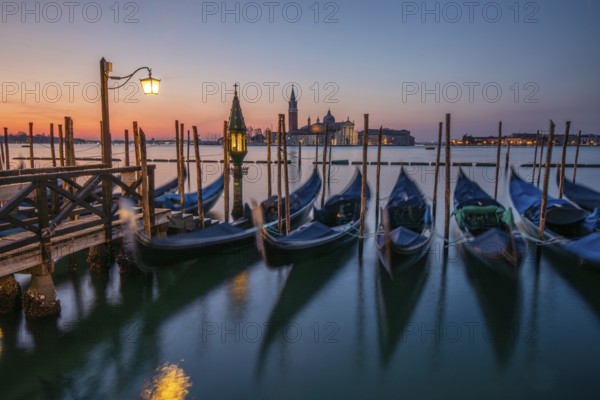 Dawn, Venetian gondolas with the church of San Giorgio Maggiore in the background, Venice, UNESCO World Heritage Site, Veneto, Italy, Europe