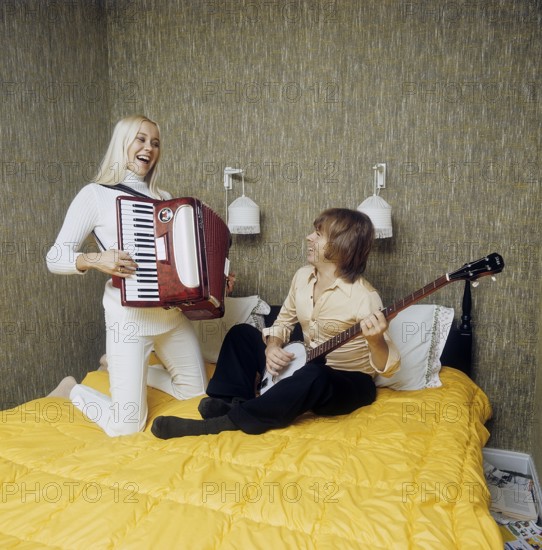 ABBA. Agnetha Fältskog. Singer. Member of the pop group ABBA. Born 1950. Pictured here at home with her fiance Björn Ulvaeus 1970 whom she married on 6 July 1971