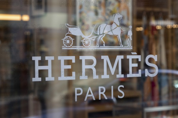 Close-up, logo of the French luxury fashion brand Hermes on a boutique in the shopping street Neuer Wall, Hamburg, Germany, Europe