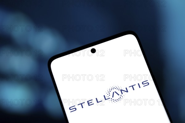 Stellantis logo is displayed on smartphone. Stellantis is a multinational automotive manufacturing company.