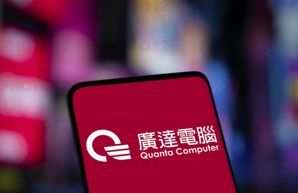 Quanta computer logo is displayed on smartphone. Quanta Computer Incorporated is a Taiwan manufacturer of notebook computers and other electronic hardware company.