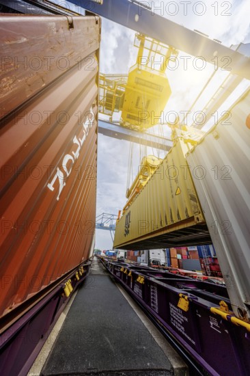 Crane loading containers onto a train in the Port of Duisburg, Terminal D3T, Logport l, Rhine, Duisburg, North Rhine-Westphalia, Germany, Europe