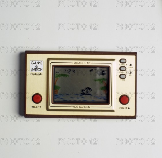 Nintendo Game & Watch. A series of handheld electronic games produced by Nintendo between 1980 to 1991. Pictured the game Parachute witch was launched june 19 1981. Wide screen Nintendo 100 series