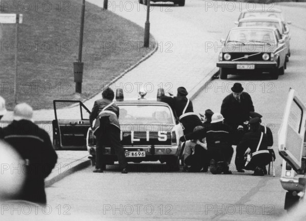 West German Embassy siege in Stockholm 1975. On April 24, 1975, Kommando Holger Meins of the armed left-wing extremist organization Red Army Faction RAF, occupied the West German Embassy on Skarpögatan in Gärdet, Stockholm. The RAF group carried out the attack with the goal of forcing the release of RAF members and others from prison in West Germany. The occupiers took a number of people hostage, including the ambassador Dietrich Stoecker. Swedish police prepared to storm the building, but before they had the chance to do so, the embassy was rocked by a series of violent explosions, the TNT had somehow been detonated. It turned out that one of the terrorists, Ulrich Wessel, had dropped a grenade, which killed him and detonated the TNT. The remaining hostages, as well as the other RAF members, all suffered severe burns. The extradition of the captured and surviving RAF militants was ordered by the Swedish then-Minister of Employment, Anna-Greta Leijon. Siegfried Hausner was flown back t...