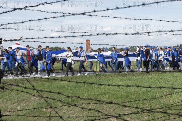 OSWIECIM, POLAND - MAY 6, 2024: March of the Living on the site of the former Auschwitz Birkenau concentration camp