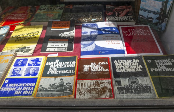Secondhand History books on display inside window of Loja do Julio bookshop, Guimaraes, Portugal, Europe