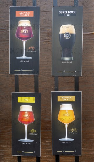 Menu board for types of beer on sale at cafe bar, Guimaraes, Portugal, Europe