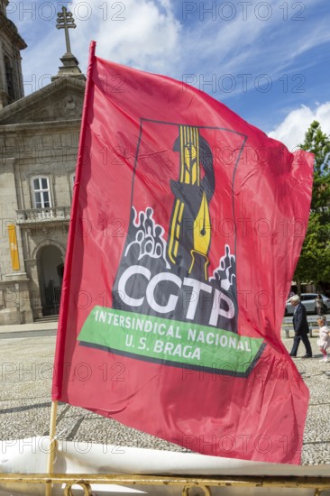 CGTP political red flag banner May Day in city of Guimaraes, Braga district, northern Portugal, Europe - 1st May 2025