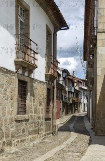 Street of historic buildings with balconies, Rua João Lopes de Faria, city centre Guimaraes, northern Portugal