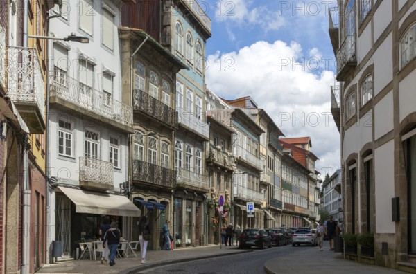 Shops in historic buildings, Rua de Santa Antonio, city centre Guimaraes, northern Portugal
