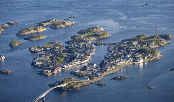 Houses on small rocky islands in the sea, view of Henningsvær, Vågan, Lofoten, Nordland, Norway, Europe