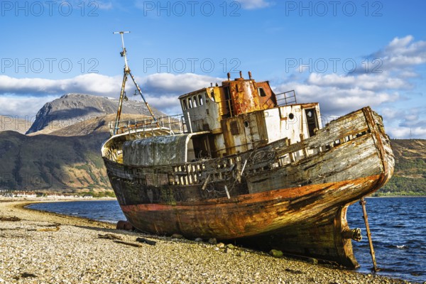 Corpach Wreck or Old Boat of Caol and Nevis Range Mountains, Caol Beach, Corpach, Fort William, Highland, Scotland, UK