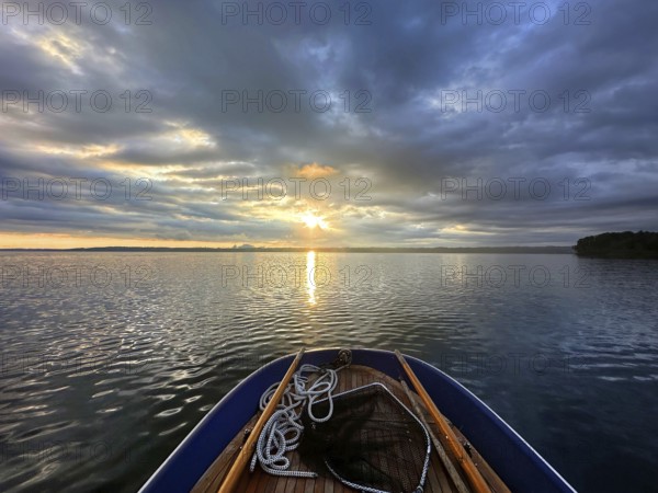 Evening mood, view from a rowing boat, Lake Starnberg, Bavaria, Germany, Europe